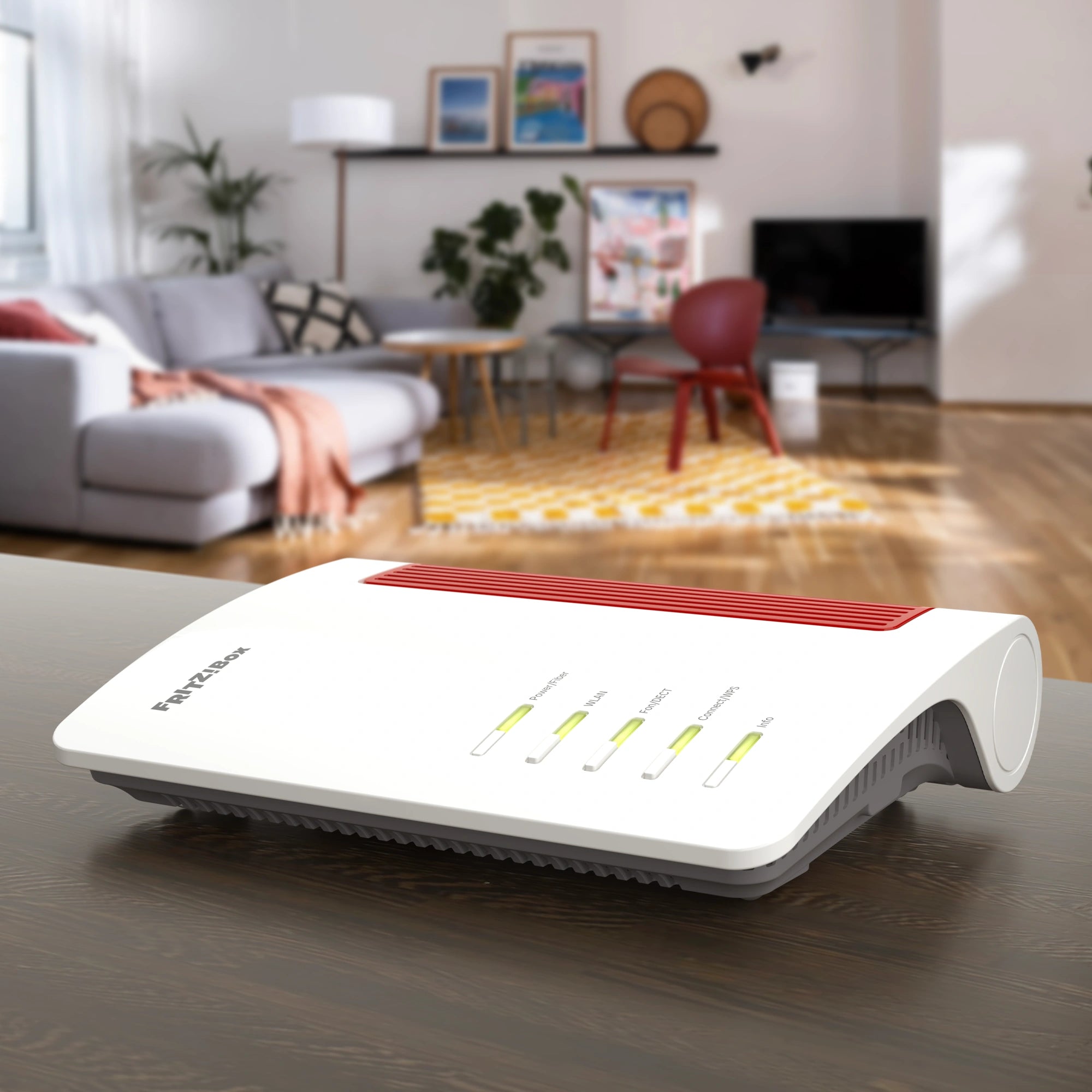 FRITZ!Box 5690 XGS Router auf einem Tisch in modernem Wohnraum, ideal für Highspeed-Internet und smarte Vernetzung.