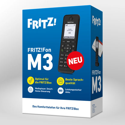 Verpackung des FRITZ!Fon M3 auf grauem Hintergrund